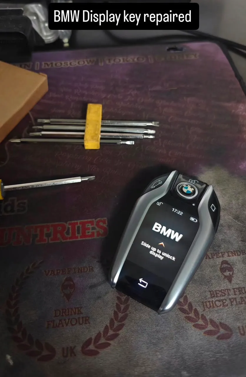 BMW Display Key Programming - Auto Messiah Workshop Mechanics in Kampala